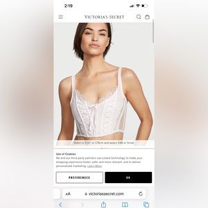 TWO Victoria  secret corset . Black and white . Both size small